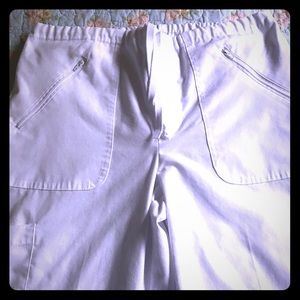 White straight legged scrub pants.